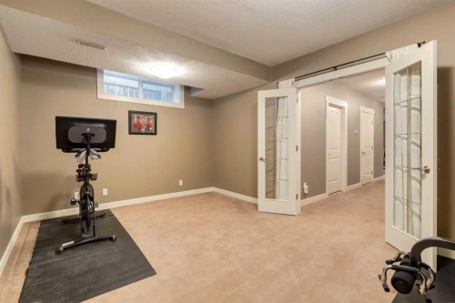 6616 Bowness Road Nw, Calgary, AB - Indoor Photo Showing Gym Room