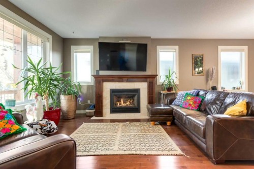 6616 Bowness Road Nw, Calgary, AB - Indoor Photo Showing Living Room With Fireplace