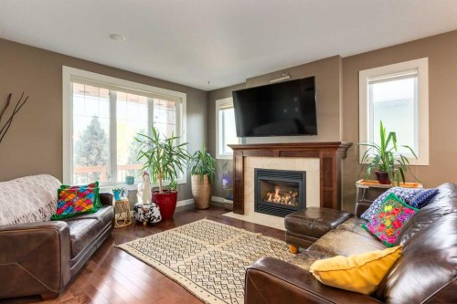6616 Bowness Road Nw, Calgary, AB - Indoor Photo Showing Living Room With Fireplace