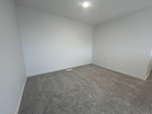 200 Belmont Way Sw, Calgary, AB - Indoor Photo Showing Other Room
