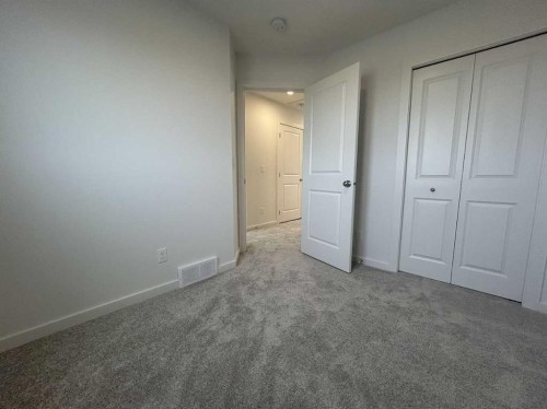200 Belmont Way Sw, Calgary, AB - Indoor Photo Showing Other Room