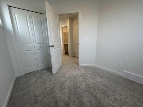 200 Belmont Way Sw, Calgary, AB - Indoor Photo Showing Other Room