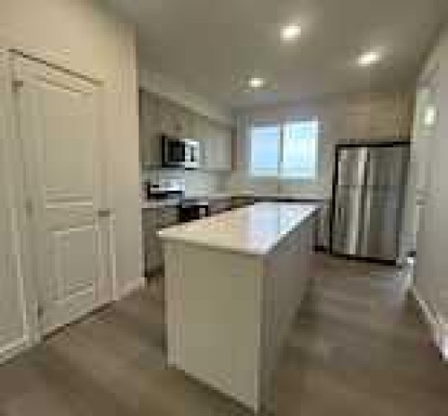 200 Belmont Way Sw, Calgary, AB - Indoor Photo Showing Kitchen