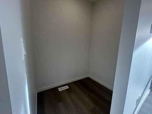 200 Belmont Way Sw, Calgary, AB - Indoor Photo Showing Other Room