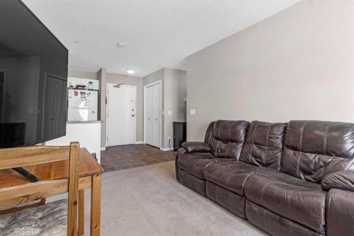 207-1010 Railway Street, Crossfield, AB - Indoor Photo Showing Living Room