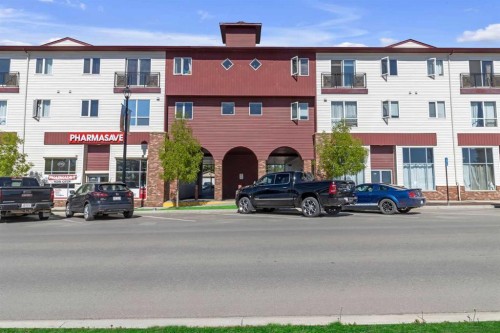 207-1010 Railway Street, Crossfield, AB - Outdoor With Facade