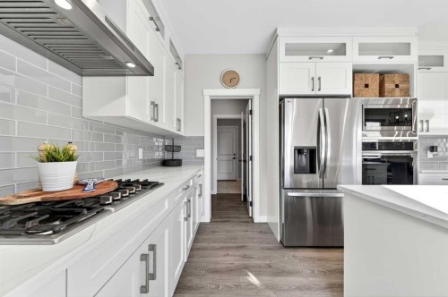 1409 Price Close, Carstairs, AB - Indoor Photo Showing Kitchen With Upgraded Kitchen