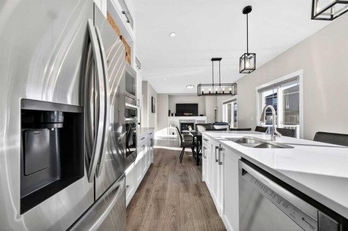 1409 Price Close, Carstairs, AB - Indoor Photo Showing Kitchen With Double Sink With Upgraded Kitchen