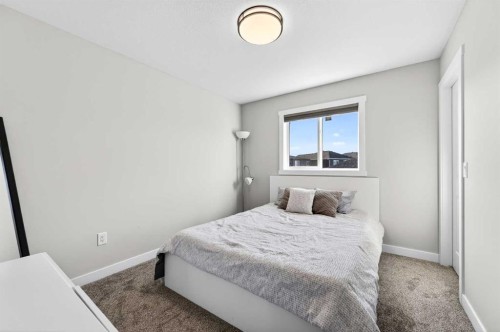 1409 Price Close, Carstairs, AB - Indoor Photo Showing Bedroom