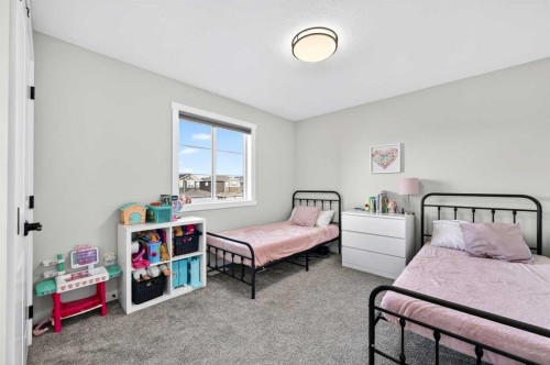 1409 Price Close, Carstairs, AB - Indoor Photo Showing Bedroom