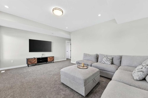 1409 Price Close, Carstairs, AB - Indoor Photo Showing Living Room