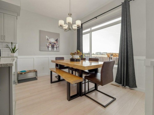 102 Blackwolf Bay North, Lethbridge, AB - Indoor Photo Showing Dining Room