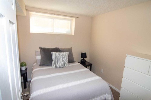2275 Reunion Street Nw, Airdrie, AB - Indoor Photo Showing Bedroom