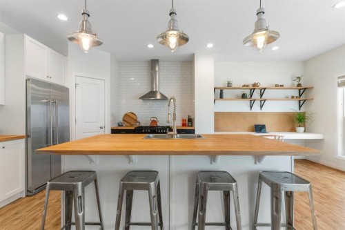 196 Jumping Pound Terrace, Cochrane, AB - Indoor Photo Showing Kitchen