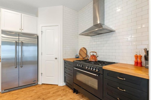 196 Jumping Pound Terrace, Cochrane, AB - Indoor Photo Showing Kitchen