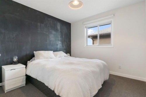 196 Jumping Pound Terrace, Cochrane, AB - Indoor Photo Showing Bedroom