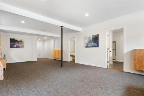 196 Jumping Pound Terrace, Cochrane, AB - Indoor Photo Showing Other Room