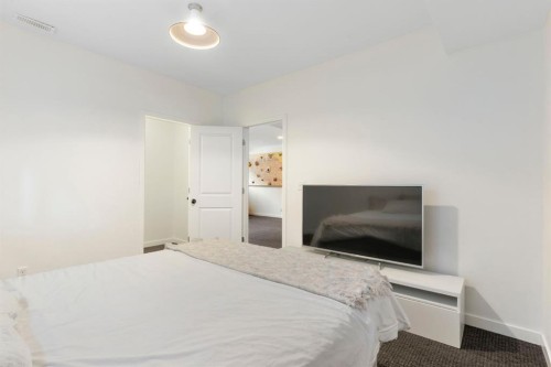 196 Jumping Pound Terrace, Cochrane, AB - Indoor Photo Showing Bedroom