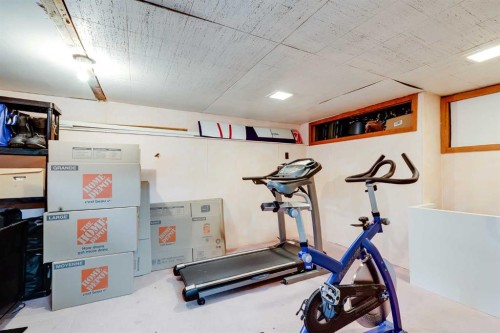 4351 70 Street Nw, Calgary, AB - Indoor Photo Showing Gym Room