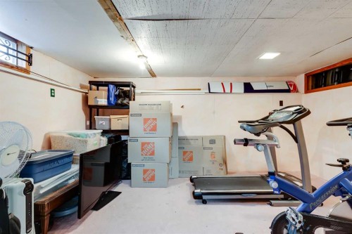 4351 70 Street Nw, Calgary, AB - Indoor Photo Showing Gym Room