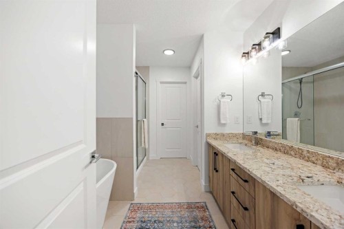 22 Hanson Drive Ne, Langdon, AB - Indoor Photo Showing Bathroom