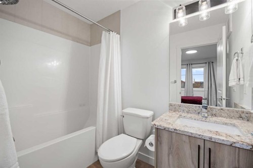 22 Hanson Drive Ne, Langdon, AB - Indoor Photo Showing Bathroom