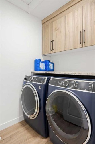 22 Hanson Drive Ne, Langdon, AB - Indoor Photo Showing Laundry Room