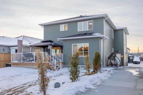 22 Hanson Drive Ne, Langdon, AB - Outdoor With Deck Patio Veranda