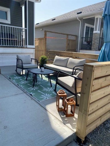 22 Hanson Drive Ne, Langdon, AB - Outdoor With Deck Patio Veranda With Exterior