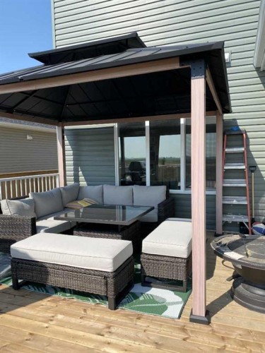 22 Hanson Drive Ne, Langdon, AB - Outdoor With Deck Patio Veranda With Exterior