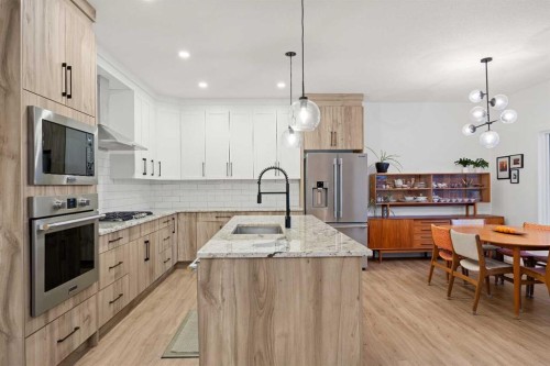 22 Hanson Drive Ne, Langdon, AB - Indoor Photo Showing Kitchen With Upgraded Kitchen