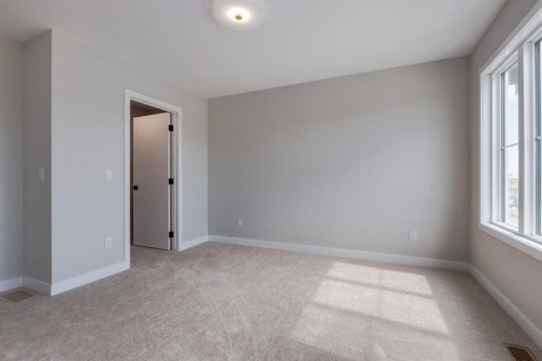 299 Sora Boulevard Se, Calgary, AB - Indoor Photo Showing Other Room