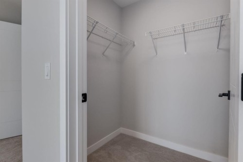 299 Sora Boulevard Se, Calgary, AB - Indoor With Storage