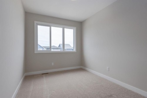 299 Sora Boulevard Se, Calgary, AB - Indoor Photo Showing Other Room