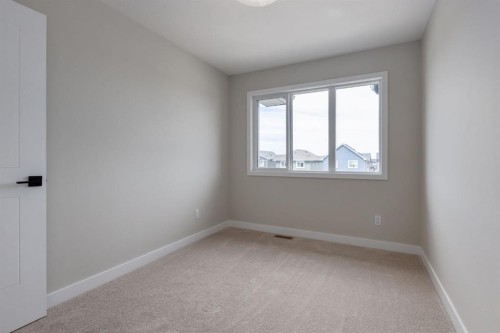 299 Sora Boulevard Se, Calgary, AB - Indoor Photo Showing Other Room