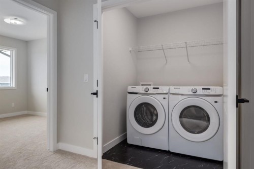 299 Sora Boulevard Se, Calgary, AB - Indoor Photo Showing Laundry Room