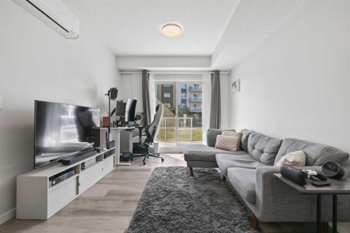 1104-220 Seton Grove Se, Calgary, AB - Indoor Photo Showing Living Room