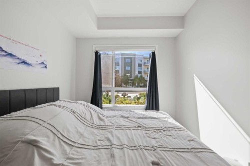 1104-220 Seton Grove Se, Calgary, AB - Indoor Photo Showing Bedroom