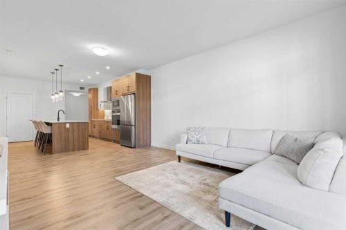 112-40 Walgrove Walk Se, Calgary, AB - Indoor Photo Showing Living Room