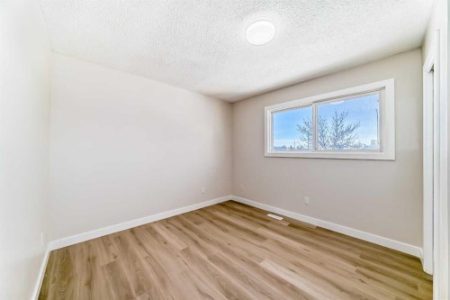 6128 Madigan Drive Ne, Calgary, AB - Indoor Photo Showing Other Room