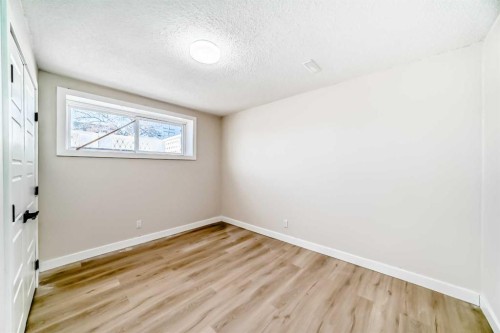6128 Madigan Drive Ne, Calgary, AB - Indoor Photo Showing Other Room