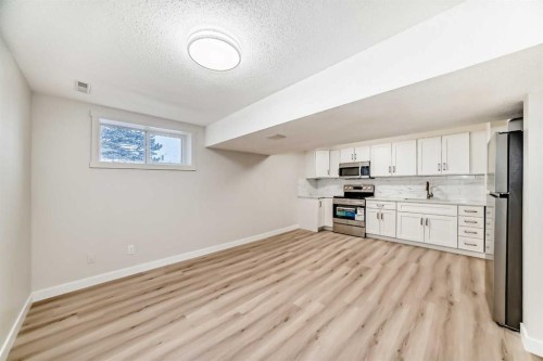 937 Marcombe Drive Ne, Calgary, AB - Indoor Photo Showing Other Room