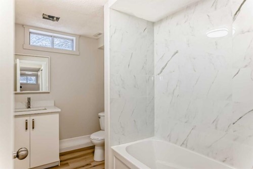 937 Marcombe Drive Ne, Calgary, AB - Indoor Photo Showing Bathroom