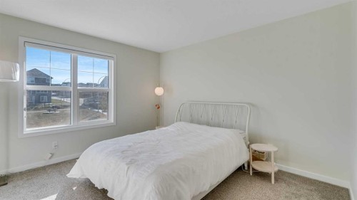 18 Amblehurst Path Nw, Calgary, AB - Indoor Photo Showing Bedroom