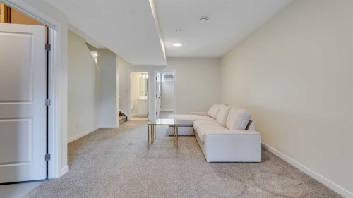 18 Amblehurst Path Nw, Calgary, AB - Indoor Photo Showing Other Room