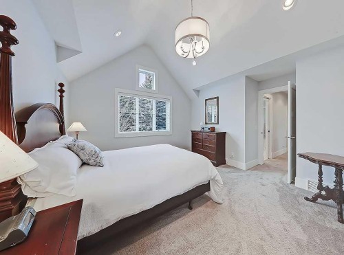 14 Rosetree Road Nw, Calgary, AB - Indoor Photo Showing Bedroom