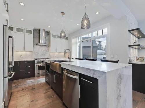 14 Rosetree Road Nw, Calgary, AB - Indoor Photo Showing Kitchen With Stainless Steel Kitchen With Upgraded Kitchen