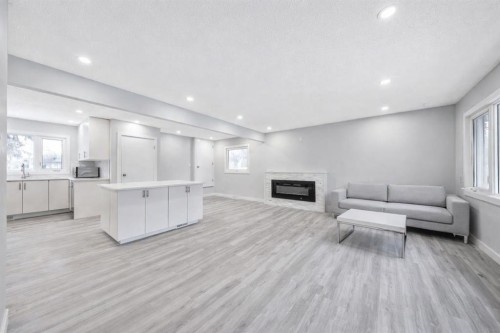 60 Fawn Crescent Se, Calgary, AB - Indoor With Fireplace