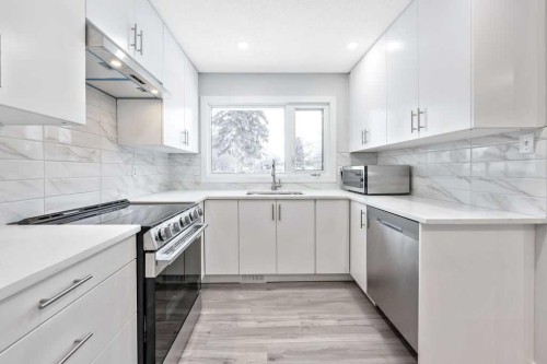 60 Fawn Crescent Se, Calgary, AB - Indoor Photo Showing Kitchen With Stainless Steel Kitchen With Upgraded Kitchen