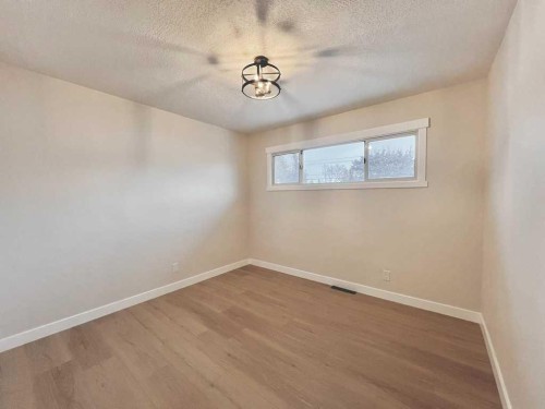 146 Springwood Drive Sw, Calgary, AB - Indoor Photo Showing Other Room